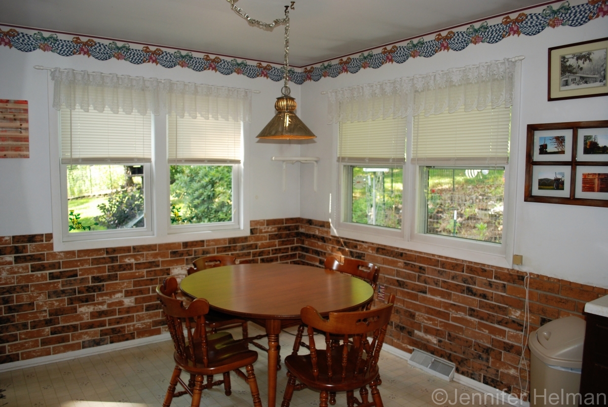 The dining area has a fantastic view of the apple tree  